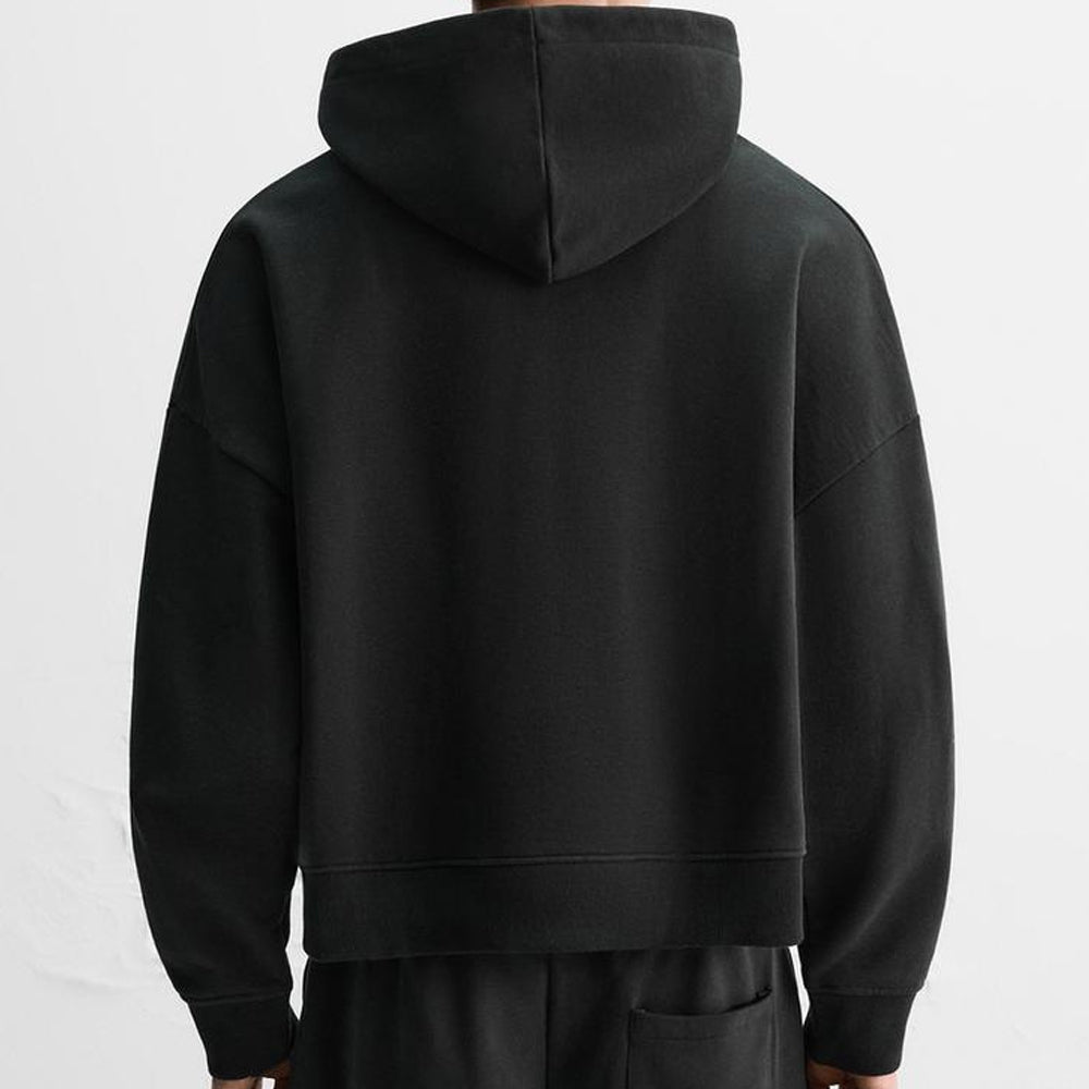 Black hoodie on a plain background