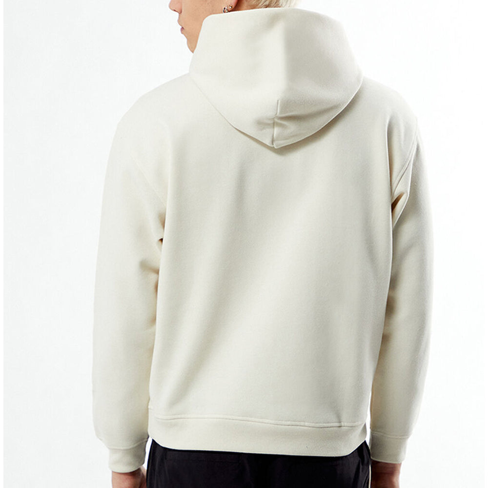 Person wearing a beige hoodie from behind on a white background