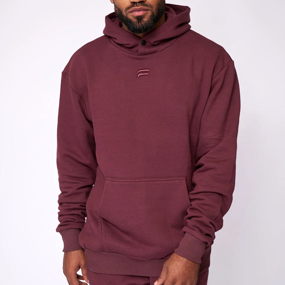 Maroon hoodie with a brand logo on a white background