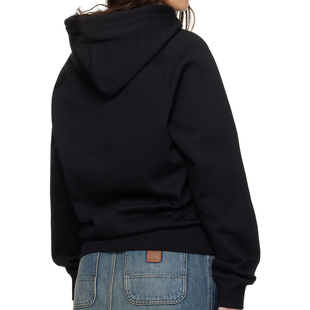Person wearing a black hoodie and blue jeans on a white background