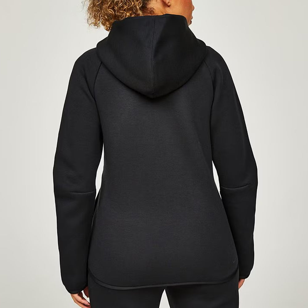 Black hoodie worn by a person on a light gray background