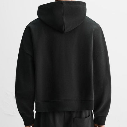Black hoodie on a plain background