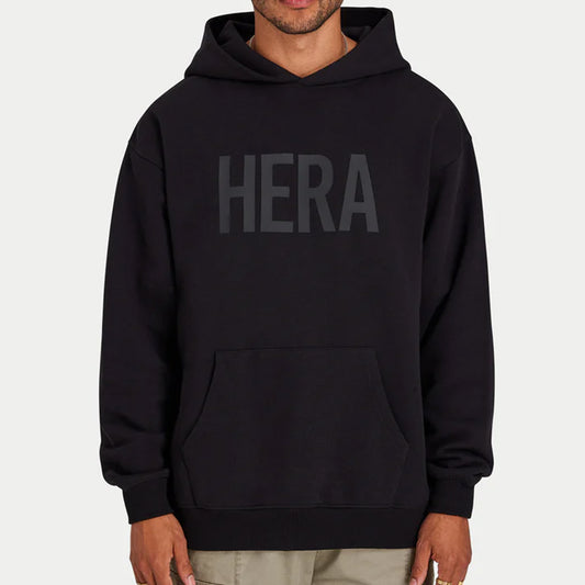 Black hoodie with 'HERA' text on a white background