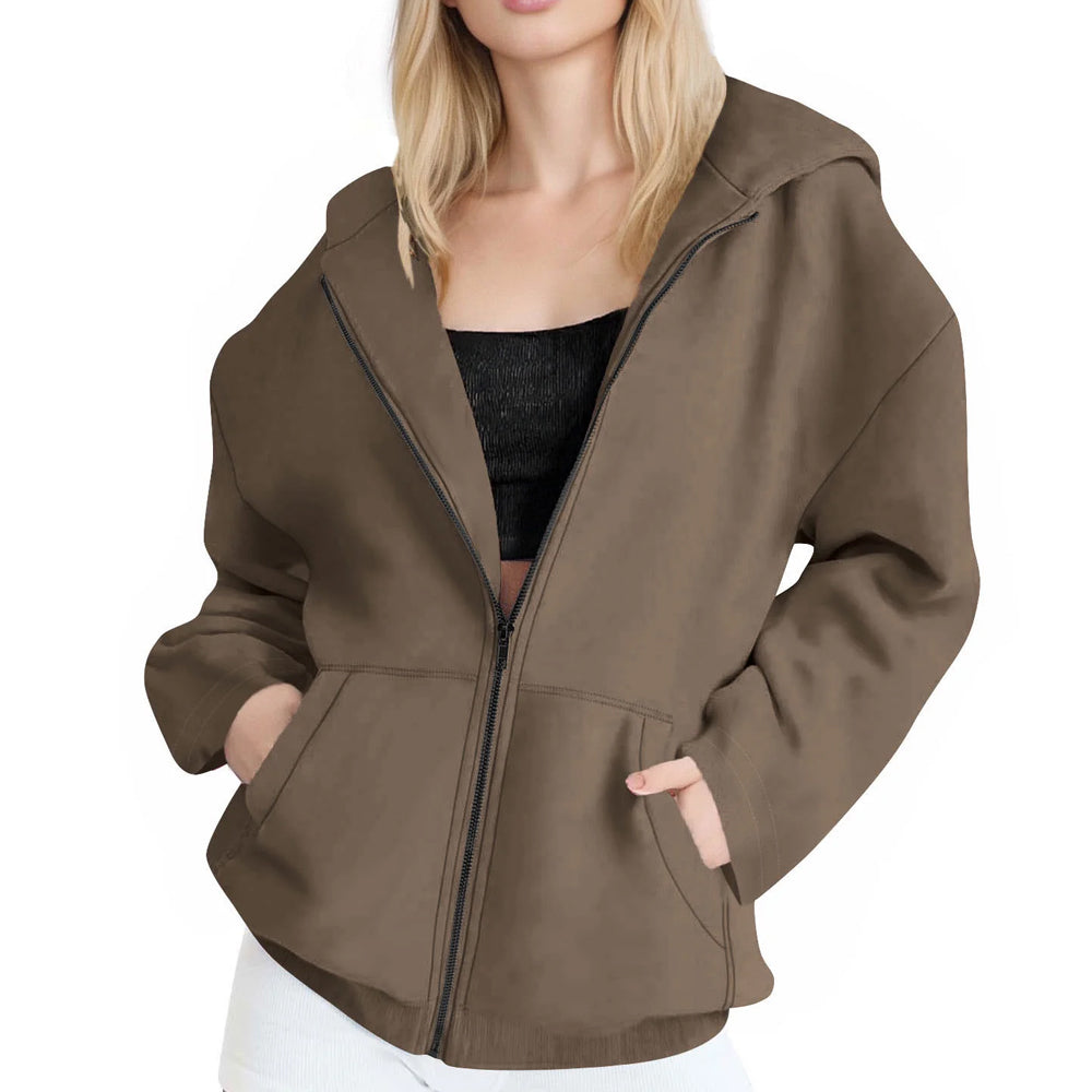 Brown jacket worn by a person on a white background