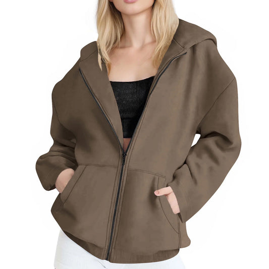 Brown jacket worn by a person on a white background