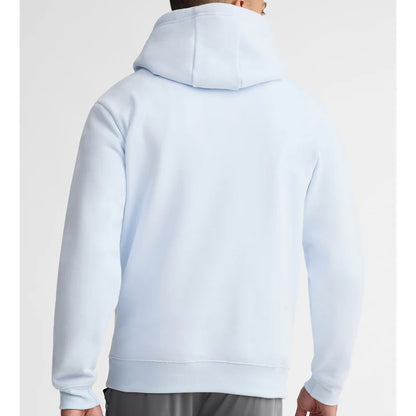 Light blue hoodie worn by a person on a white background