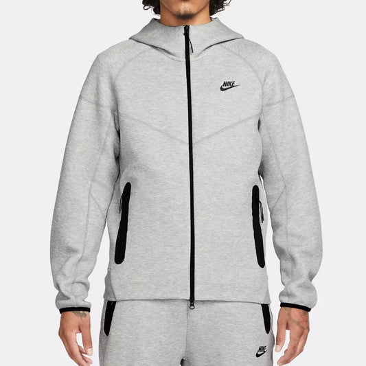 Gray Nike tracksuit with black accents on a white background