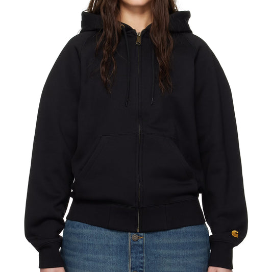 Person wearing a black hoodie with a visible brand logo on a white background