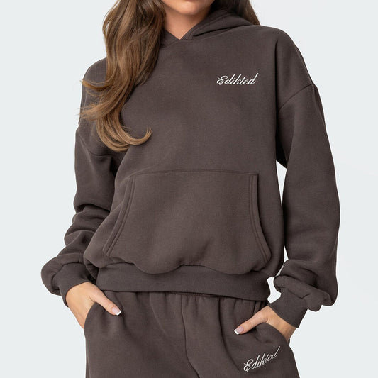 Brown hoodie with 'Editted' branding on a light gray background