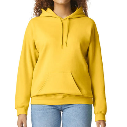 Yellow hoodie worn by a person on a white background